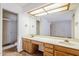 Ensuite bathroom with dual sinks, large mirror, and separate shower at 3415 N 36Th St # 3, Phoenix, AZ 85018