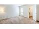 Bright bedroom with neutral carpet, plantation shutters, and walk-in closet at 3415 N 36Th St # 3, Phoenix, AZ 85018