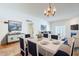 Elegant dining room adjacent to living area with modern decor and ample seating at 3415 N 36Th St # 3, Phoenix, AZ 85018