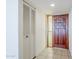 Entryway showcasing wood door, tiled flooring and coat closet at 3415 N 36Th St # 3, Phoenix, AZ 85018