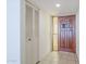 Entryway showcasing wood door, tiled flooring and coat closet at 3415 N 36Th St # 3, Phoenix, AZ 85018