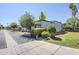 Exterior view showcasing mature trees, green lawns, landscaping, and building architecture at 3415 N 36Th St # 3, Phoenix, AZ 85018