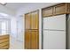 Kitchen featuring wooden cabinets and drawers plus white refrigerator at 3415 N 36Th St # 3, Phoenix, AZ 85018