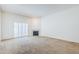 Bright living room features a fireplace and access to a patio at 3415 N 36Th St # 3, Phoenix, AZ 85018