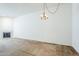 Living area featuring a fireplace, chandelier, and carpeted floor at 3415 N 36Th St # 3, Phoenix, AZ 85018