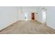 Open-concept living room featuring neutral paint, carpeting, and recessed lighting at 3415 N 36Th St # 3, Phoenix, AZ 85018