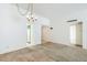 Open floor plan with a view of the kitchen from a spacious living area at 3415 N 36Th St # 3, Phoenix, AZ 85018