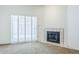 Corner living room with natural light, fireplace and large windows at 3415 N 36Th St # 3, Phoenix, AZ 85018