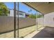Covered back patio with metal railing and a view of the complex's neighboring buildings at 3415 N 36Th St # 3, Phoenix, AZ 85018