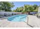 View of the community pool surrounded by lounge seating at 3415 N 36Th St # 3, Phoenix, AZ 85018