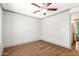 Bedroom features ceiling fan, gray walls, and carpet at 3507 W Oakland St, Chandler, AZ 85226