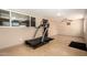 Bonus room featuring tile flooring, ceiling fan and a treadmill workout machine at 3507 W Oakland St, Chandler, AZ 85226