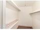 Walk in closet with shelving and floral patterned accents at 3507 W Oakland St, Chandler, AZ 85226