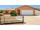Charming single-story home featuring a two-car garage and easy to maintain desert landscaping at 3507 W Oakland St, Chandler, AZ 85226