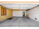Spacious garage with concrete flooring, insulated garage door, and ample space for storage and parking at 3507 W Oakland St, Chandler, AZ 85226