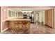 Well-lit kitchen featuring stainless steel appliances and a breakfast bar with ample seating at 3507 W Oakland St, Chandler, AZ 85226