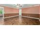 Bright living room featuring neutral paint, flooring, and a smooth transition into other rooms at 3507 W Oakland St, Chandler, AZ 85226
