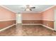 Bright living room featuring neutral paint, flooring, and a smooth transition into other rooms at 3507 W Oakland St, Chandler, AZ 85226