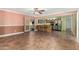 Open living room with access to kitchen, a versatile space ideal for modern living and entertaining at 3507 W Oakland St, Chandler, AZ 85226