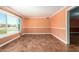Spacious living room with large window and tile flooring, perfect for relaxing or entertaining at 3507 W Oakland St, Chandler, AZ 85226