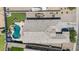 Aerial view showcasing backyard with a pool, artificial grass, boat/trailer parking, and privacy fence at 37460 W Giallo Ln, Maricopa, AZ 85138