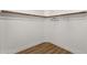 Walk-in closet with shelves and wood rod at 389 W Fairway Pl, Chandler, AZ 85225