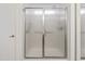 Bathroom features a glass shower with modern fixtures at 43813 W Rio Lobo Dr, Maricopa, AZ 85138