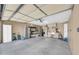 Spacious garage with ample storage, water heater, utility sink, and epoxy floors at 46068 W Guilder Ave, Maricopa, AZ 85139