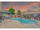 Gorgeous pool and spa area with a gazebo and lush landscaping, perfect for relaxation and entertainment at 46068 W Guilder Ave, Maricopa, AZ 85139