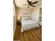 Serene bedroom with hardwood floors, soft lighting, and a comfortable queen-sized bed at 514 N 74Th St, Scottsdale, AZ 85257