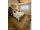 Cozy bedroom featuring natural light, ceiling fan, and a comfortable bed with wood accents at 514 N 74Th St, Scottsdale, AZ 85257