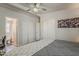 Bedroom featuring an ensuite bathroom and an adjacent closet at 5735 E Mcdowell Rd # 108, Mesa, AZ 85215