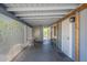 The spacious carport with lattice and metal doors is an inviting entrance at 5735 E Mcdowell Rd # 108, Mesa, AZ 85215