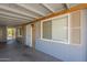 Spacious covered carport featuring neutral tones and natural wood post accents at 5735 E Mcdowell Rd # 108, Mesa, AZ 85215