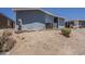 Exterior angle of home showing central A/C and utility boxes at 5735 E Mcdowell Rd # 108, Mesa, AZ 85215