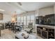 Open living space features a dining area and a television viewing area at 5735 E Mcdowell Rd # 108, Mesa, AZ 85215
