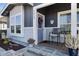 Charming home entrance with well-maintained landscaping, a decorative wreath, and a cozy front porch at 650 N Hawes Rd # 2819, Mesa, AZ 85207