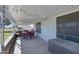 Relaxing covered patio with string lights and comfortable outdoor furniture, perfect for entertaining guests at 650 N Hawes Rd # 2819, Mesa, AZ 85207