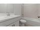 Bathroom featuring a white sink and vanity paired with a tub and shower combination at 7421 S 76Th Ln, Laveen, AZ 85339