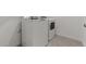 Convenient laundry room equipped with a washing machine and a dryer for your laundry needs at 7421 S 76Th Ln, Laveen, AZ 85339