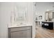 Modern powder room with a stylish mirror and elegant fixtures at 7454 S 75Th Dr, Laveen, AZ 85339