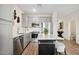 Beautiful kitchen features gray cabinets, stainless steel appliances, and a marble island at 7454 S 75Th Dr, Laveen, AZ 85339