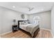 Stylish bedroom features a decorative headboard, side tables, and plantation shutters at 7835 E Cannon Dr, Scottsdale, AZ 85258