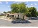 Street view of a charming property showcases the desert landscape and appealing architectural details at 7835 E Cannon Dr, Scottsdale, AZ 85258