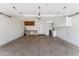 Spacious garage with ample storage cabinets and a functional workspace at 7835 E Cannon Dr, Scottsdale, AZ 85258