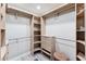 Spacious walk-in closet features custom shelving, drawers, and ample hanging space at 7835 E Cannon Dr, Scottsdale, AZ 85258