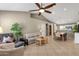 Inviting living room featuring neutral tones, tiled floors, and contemporary furnishings at 823 W Kyle Ct, Gilbert, AZ 85233