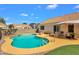 Private backyard pool with patio area, perfect for enjoying the outdoors at 823 W Kyle Ct, Gilbert, AZ 85233