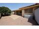 Low maintenance backyard with covered patio provides ample space for relaxing and entertaining at 8303 E Monterey Ave, Mesa, AZ 85209