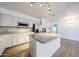 Open kitchen featuring stainless steel appliances and an expansive island at 8303 E Monterey Ave, Mesa, AZ 85209